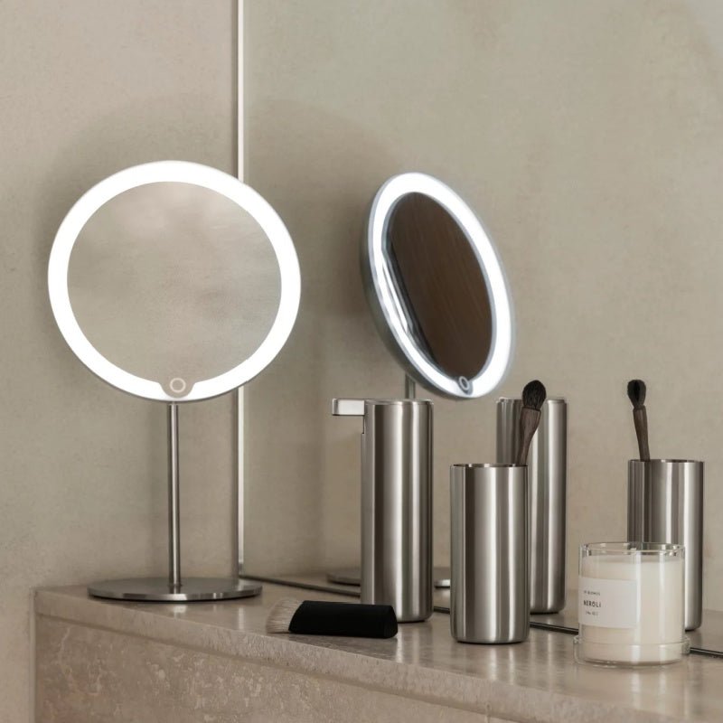 Tabletop Blomus LED Vanity Mirror, 5x - Matt Stainless Steel - Rechargeable 65517 - mood photo installed in bathroom - The Magnifying Mirror Store